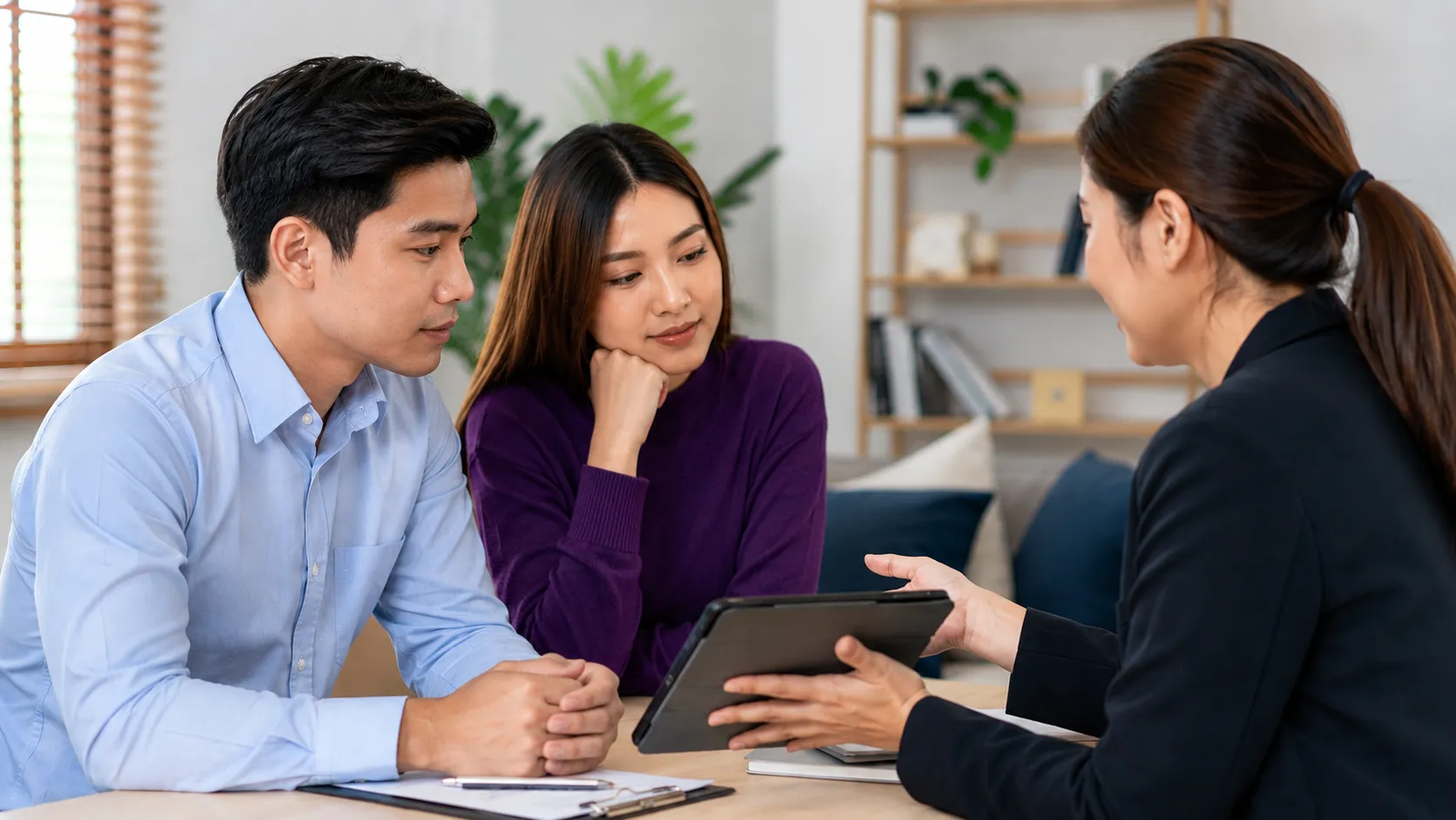 Filipino couple comparing HMO vs Purple Shield plans
